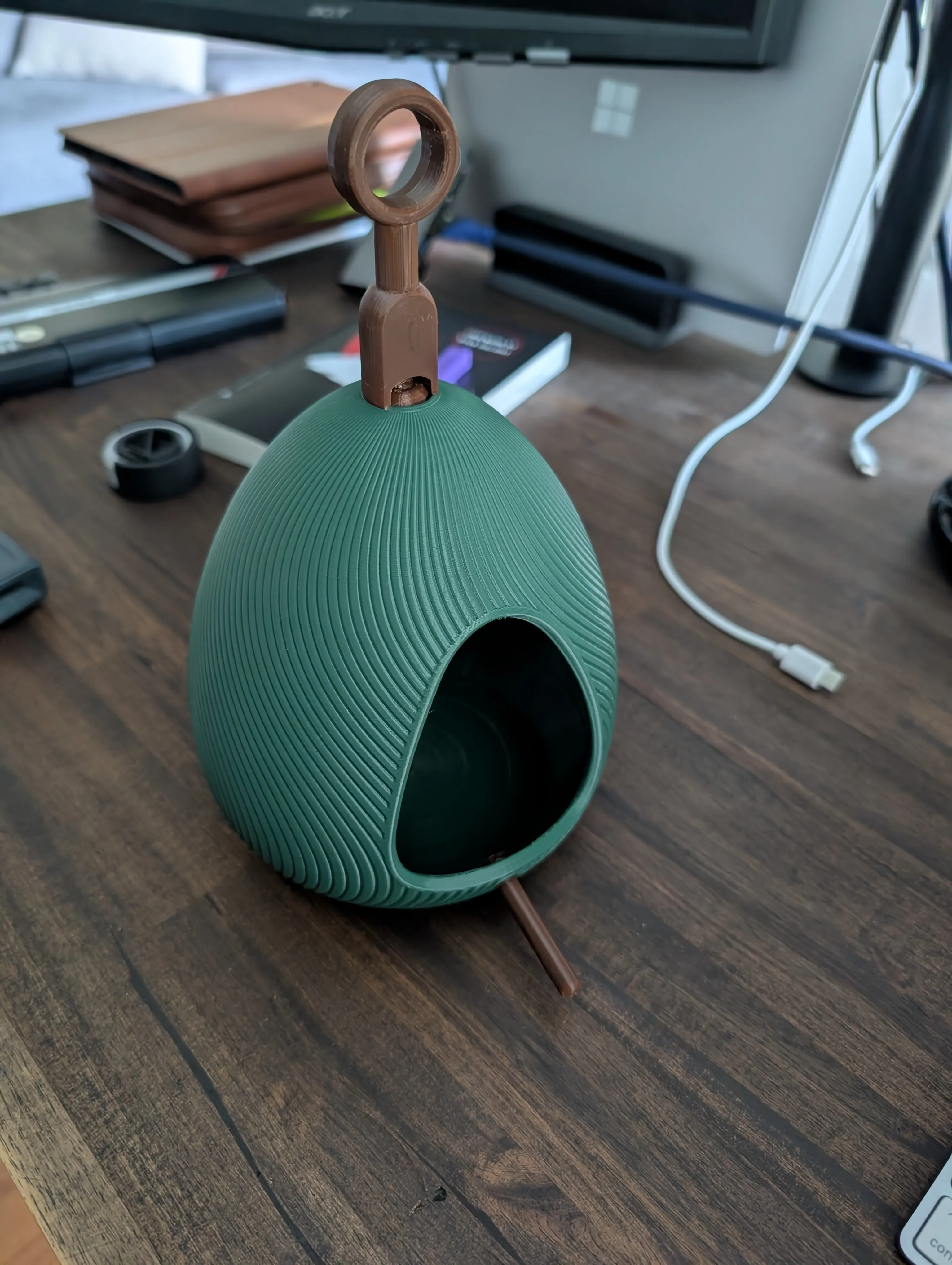 A 3D printed bird feeder green