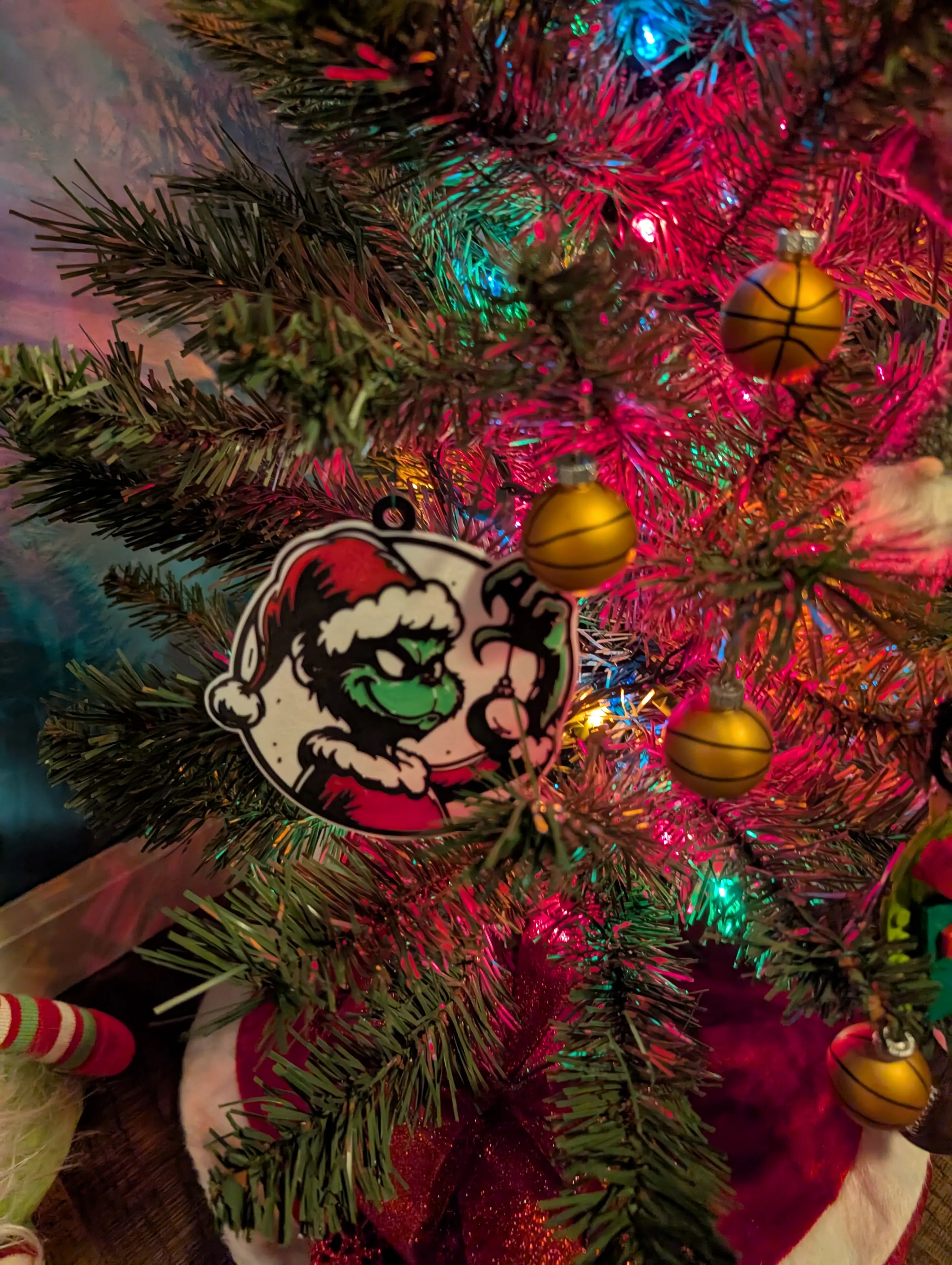 A 3D printed grinch christmas ornament
