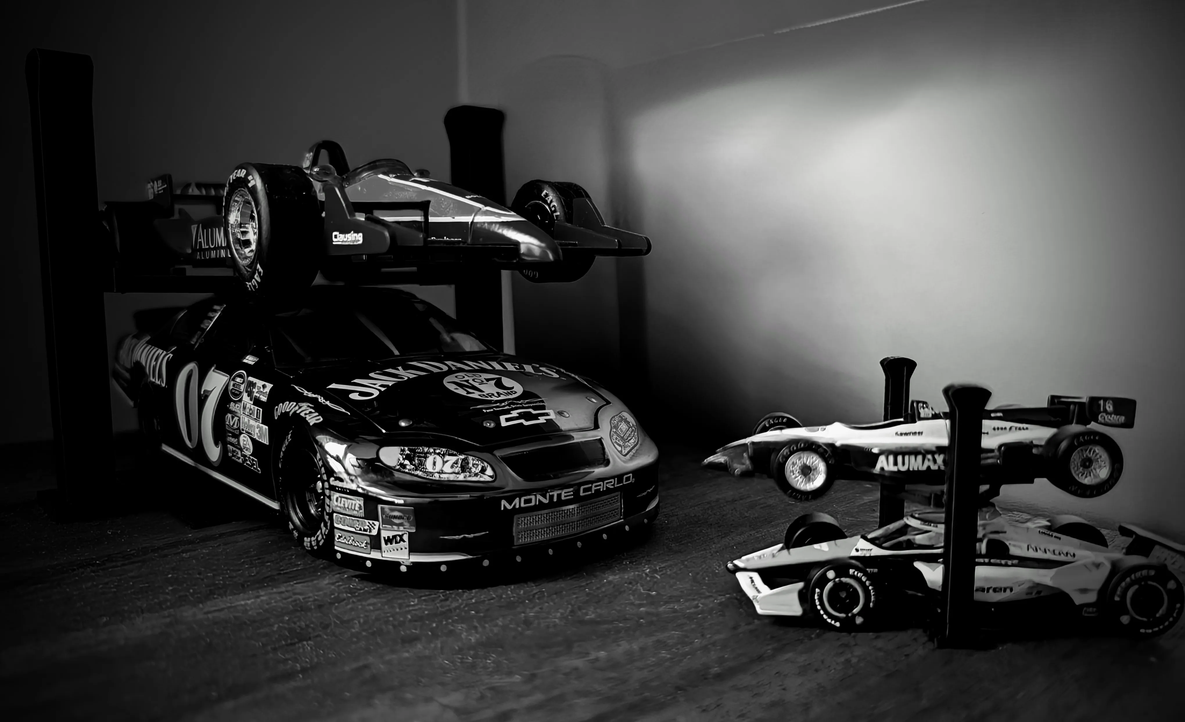 A 3D printed die-cast model car lifts